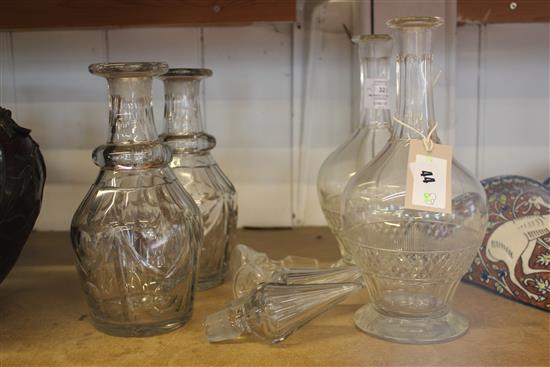 Two pair of cut glass decanters